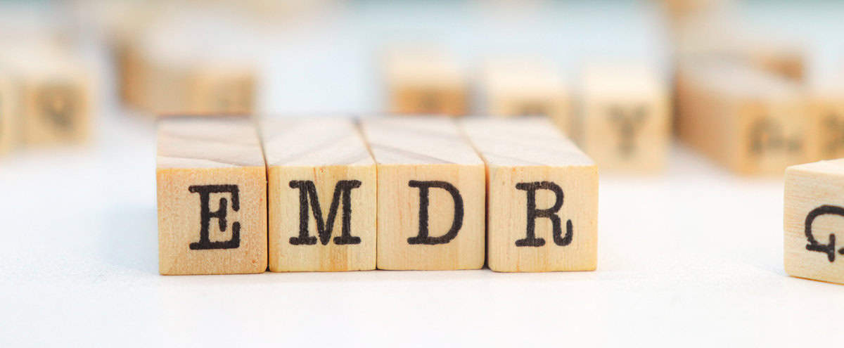 emdr acronym on wooden cubes