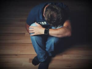 Man Depressed Sitting